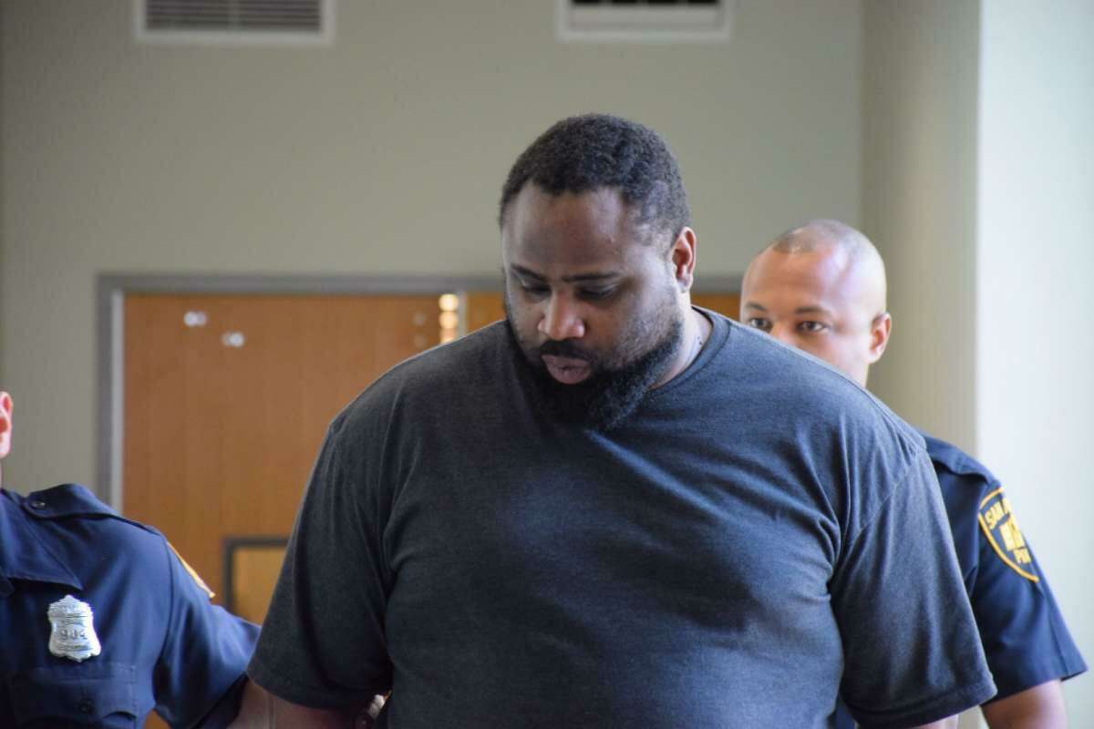 R.C. Curtis, shown here after his arrest in 2015, is accused of killing his grandmother-in-law, Paula Mendez Boyd, who was robbed and beaten in her Northwest Side apartment.