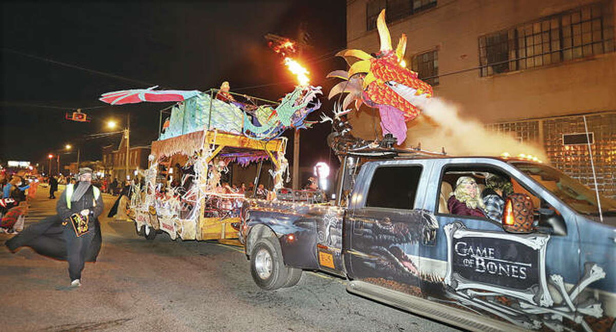 Thousands lined East Broadway and Piasa Street Saturday for the 104th annual Alton Halloween Parade. The fire breathing dragon float from orthopedic surgeon Dr. Bruce Vest’s clinic was again a big hit this year.