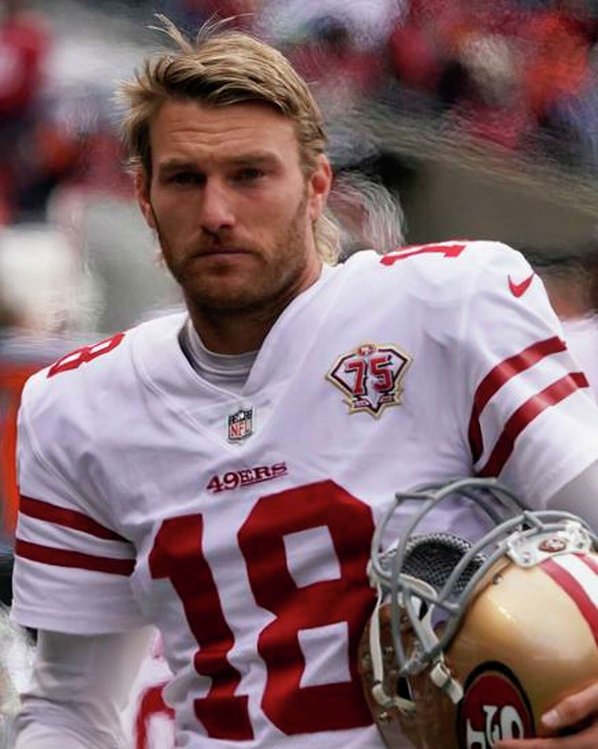 San Francisco 49ers punter Mitch Wishnowsky (18) on the sidelines during the second half of an NFL football game Sunday, Oct. 31, 2021, in Chicago. (AP Photo/David Banks)