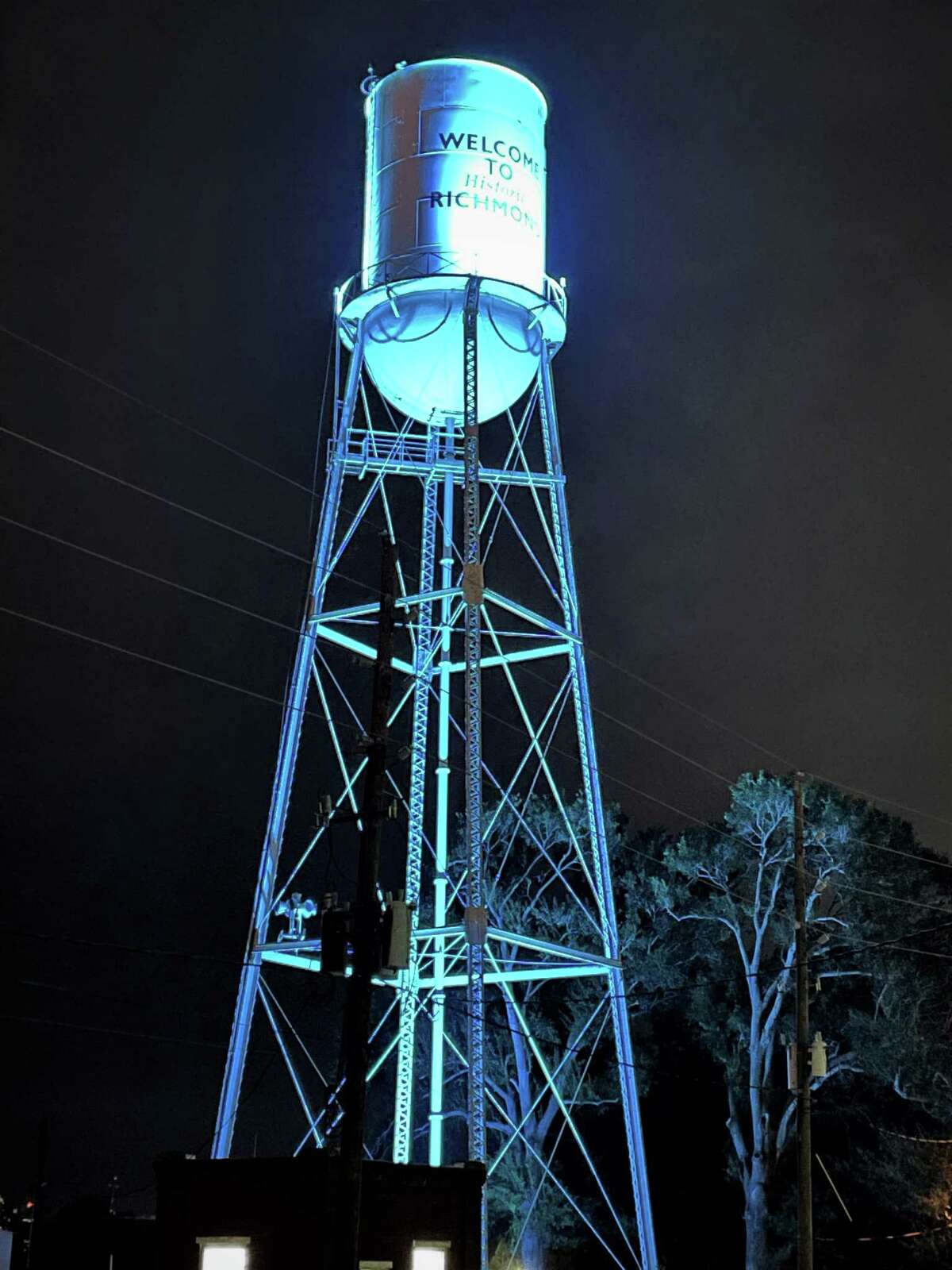 Richmond water tower lit teal for Alzheimer’s awareness