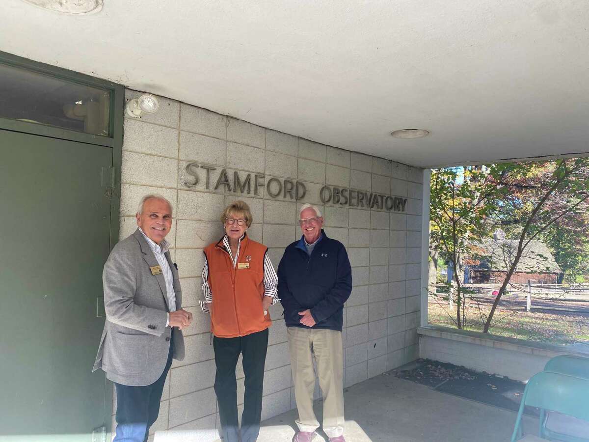 Stamford Museum and Nature Center President Melissa Mulrooney poses with Board of Directors President Harry Day and former Lieutenant Gov. Michael Fedele about the aging Stamford Observatory on Monday, Nov. 1, 2021. Mulrooney wants to take the organization's decommissioned observatory into the 21st by building at $10 million facility that could rival New York City's Hayden Planetarium.