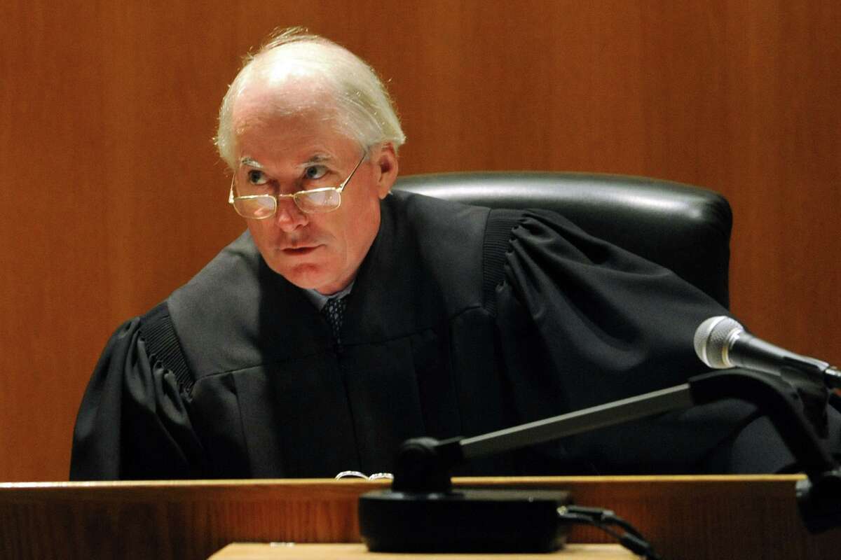 Then-Judge Robert Devlin presides at a trial in Bridgeport Superior Court, in Bridgeport, Conn., June 24th, 2013. Devlin is now serving as inspector general, investigating police deadly force cases.