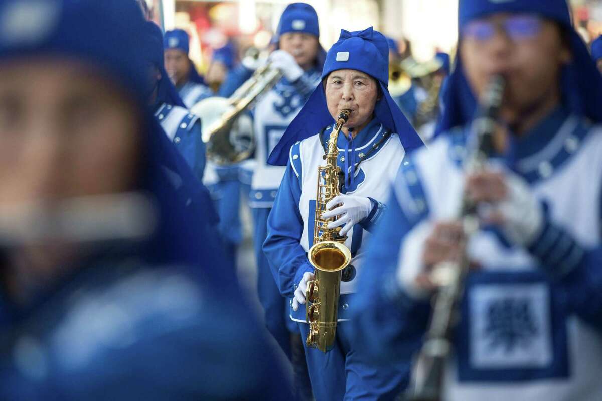 The Tian Guo Marching Band takes part in the 2019 Veterans Day Parade in San Francisco.