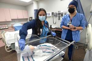 Instructor Andrea Reyes walks through baby care procedures with nursing student Ashlynn Ortiz during a morning lab at Lamar State College Port Arthur. Photo made Friday, November 5, 2021 Kim Brent/The Enterprise