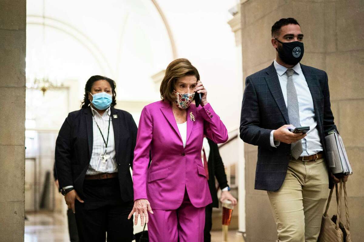 Speaker of the House Nancy Pelosi, D-Calif., arrives for the day on Capitol Hill on Friday, Nov. 5, 2021 in Washington, D.C.