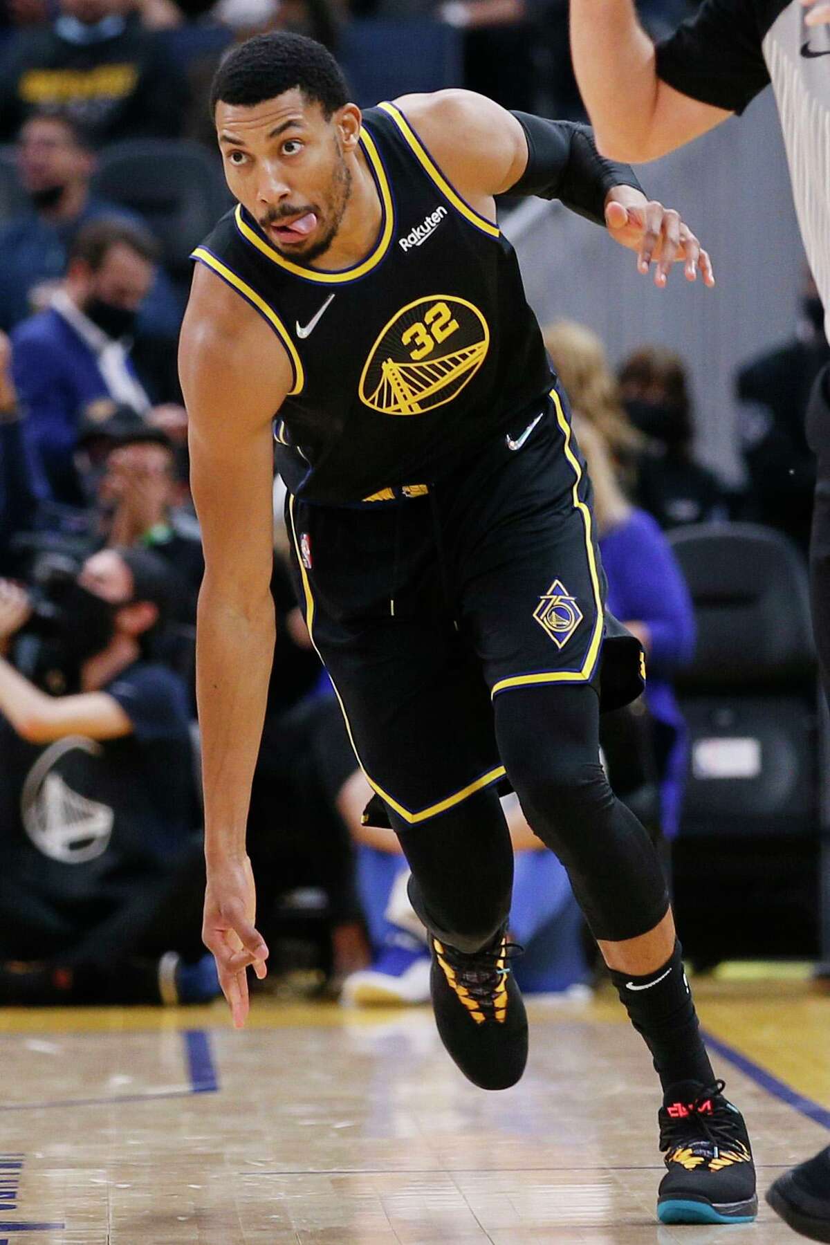 Golden State Warriors forward Otto Porter Jr. (32) reacts after scoring a three-point shot in the first half of an NBA game against the New Orleans Pelicans at Chase Center, Friday, Nov. 5, 2021, in San Francisco, Calif.