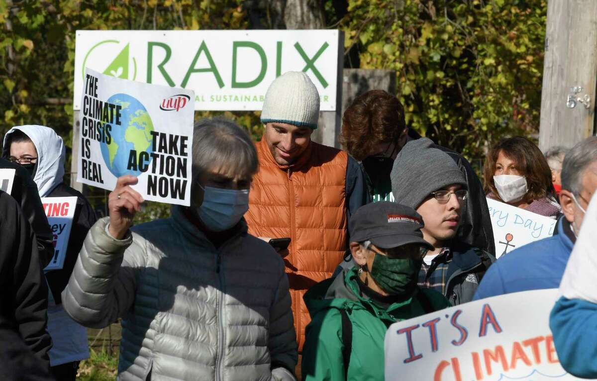 A coalition of Capital Region climate and community faith groups holding a rally as part of the COP26-focused Global Day of Action for Climate Justice at the Radix Ecological Sustainability Center Saturday, Nov. 6, 2021, in Albany, N.Y. (Hans Pennink/Special to the Times Union)