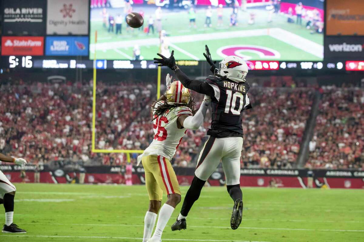 Wide receiver (10) DeAndre Hopkins of the Arizona Cardinals catches a pass for a touchdown against the San Francisco 49ers in an NFL football game, Sunday, Oct. 10, 2021, in Glendale, Ariz. Cardinals defeated the 49ers 17-10. (AP Photo/Jeff Lewis)
