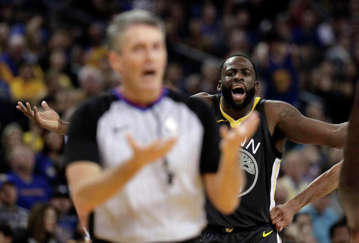 Draymond Green (23) reacts after he had a technical foul called on him in the second half as the Golden State Warriors played the Los Angeles Clippers at Oracle Arena in Oakland, Calif., on Sunday, December 23, 2018.
