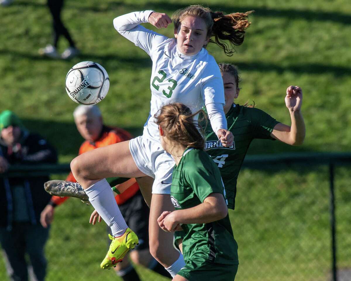 Shenendehowa junior Emily Silva gets a head on the ball in front of Fayetteville-Manlius senior Brigid Teaken during the Class AA state quarterfinals at Herkimer Community College on Saturday, Nov. 6, 2021 (Jim Franco/Special to the Times Union)
