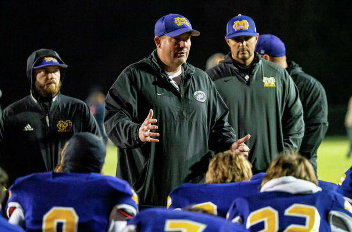Civic Memorial coach Mike Parmentier has been elected to the  Illinois High School Football Coaches Association Hall of Fame. He is shown as he speaks to his team following last season's playoff loss to Sacred Heart-Griffin.