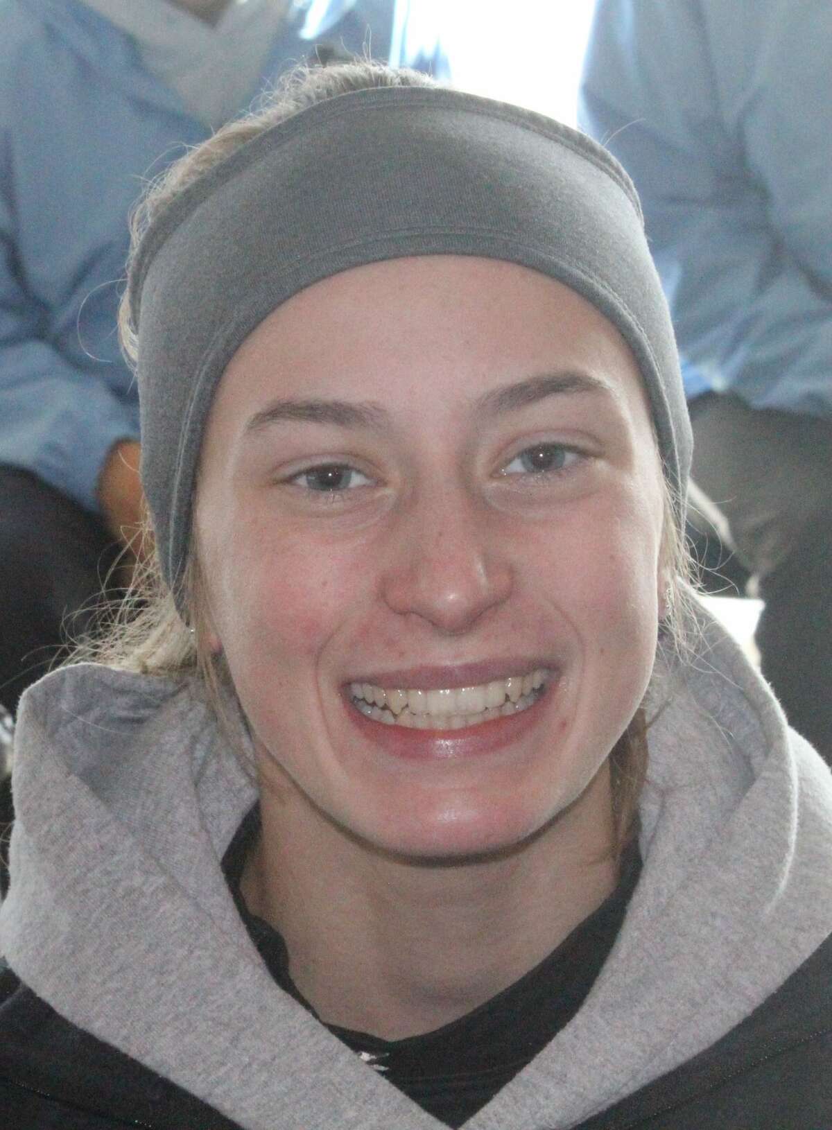 Crossroads' Amelia Thompson is all smiles after her All-State cross country performance on Saturday.