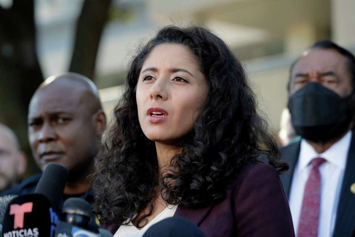 Houston County Judge Lina Hidalgo, center, flanked by Houston Police Chief Troy Finner, left, and U.S. Rep. Al Green, right, speaks during a news conference, Saturday, Nov. 6, 2021, in Houston, after several people died and scores were injured during a music festival the night before.