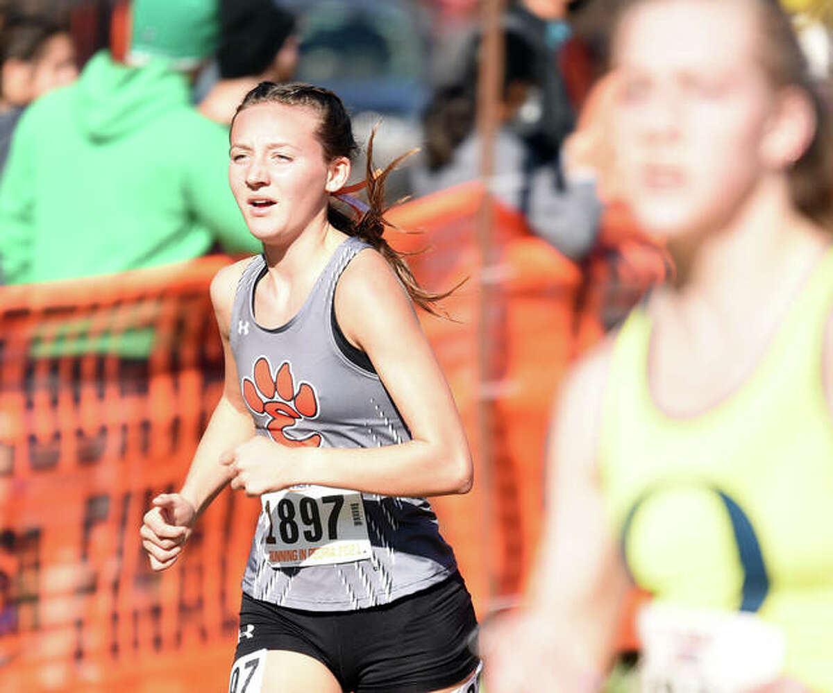 Edwardsville’s Emily Nuttall competes in the Class 3A girls cross country state meet on Saturday at Detweiler Park in Peoria.