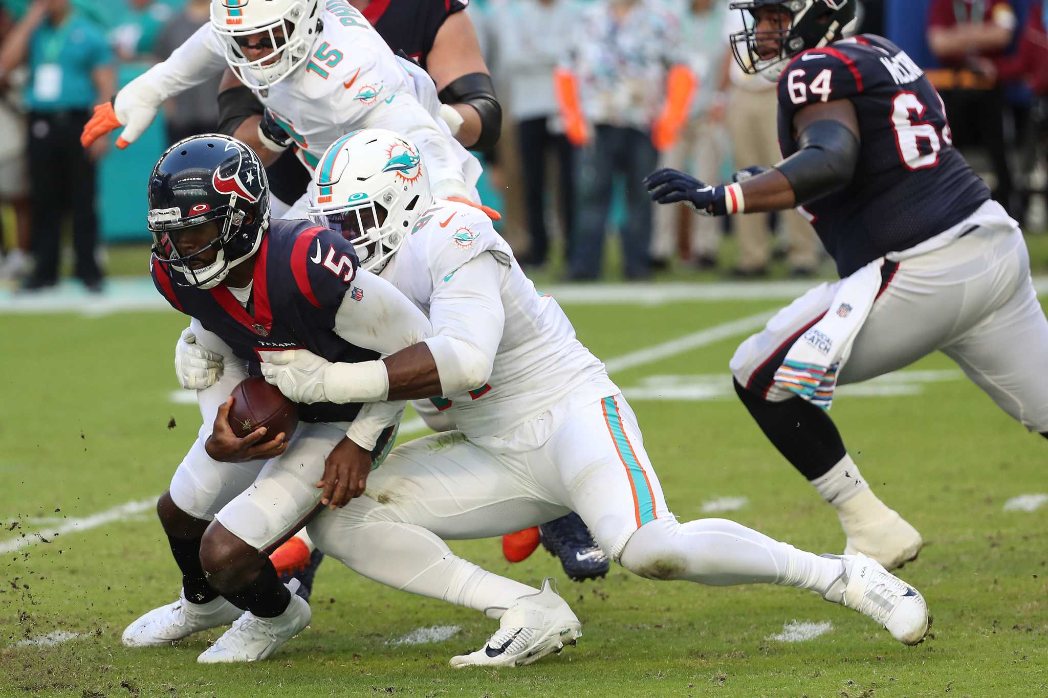 Teams combine for 9 turnovers; Dolphins defeat Texans 17-9