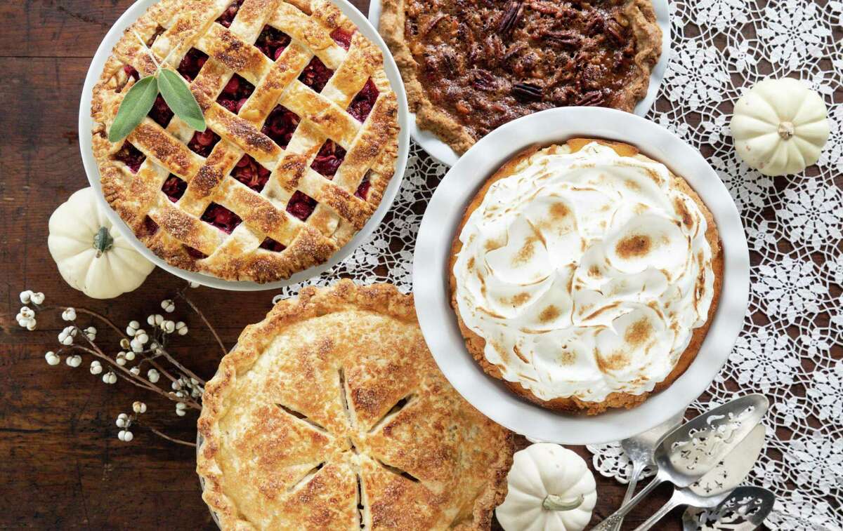 Cranberry Sage Pie, clockwise from top left, Thre Nut Pie, Oh My Gourd! pie and Spiced Apple Pear Pie. Styling by Carla Buerkle, tableware provided by Kuhl-Linscomb.