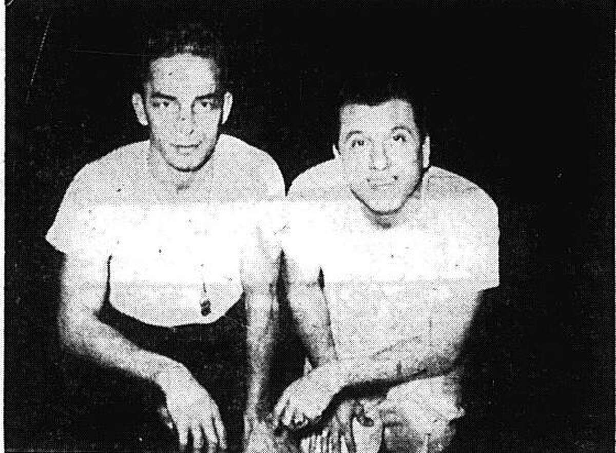 Edwardsville boys basketball coach Joe Lucco, right, with assistant coach Dick Hutton.