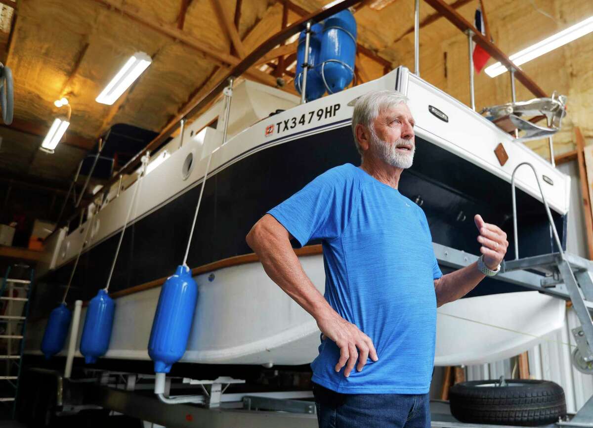 Carey Stanly talks about the 33-foot catamaran sailboat he built, Wednesday, Oct. 26, 2021, in Willis. Stanly and several friends sailed for three weeks down the Ohio River in Kentucky on the boat this year.