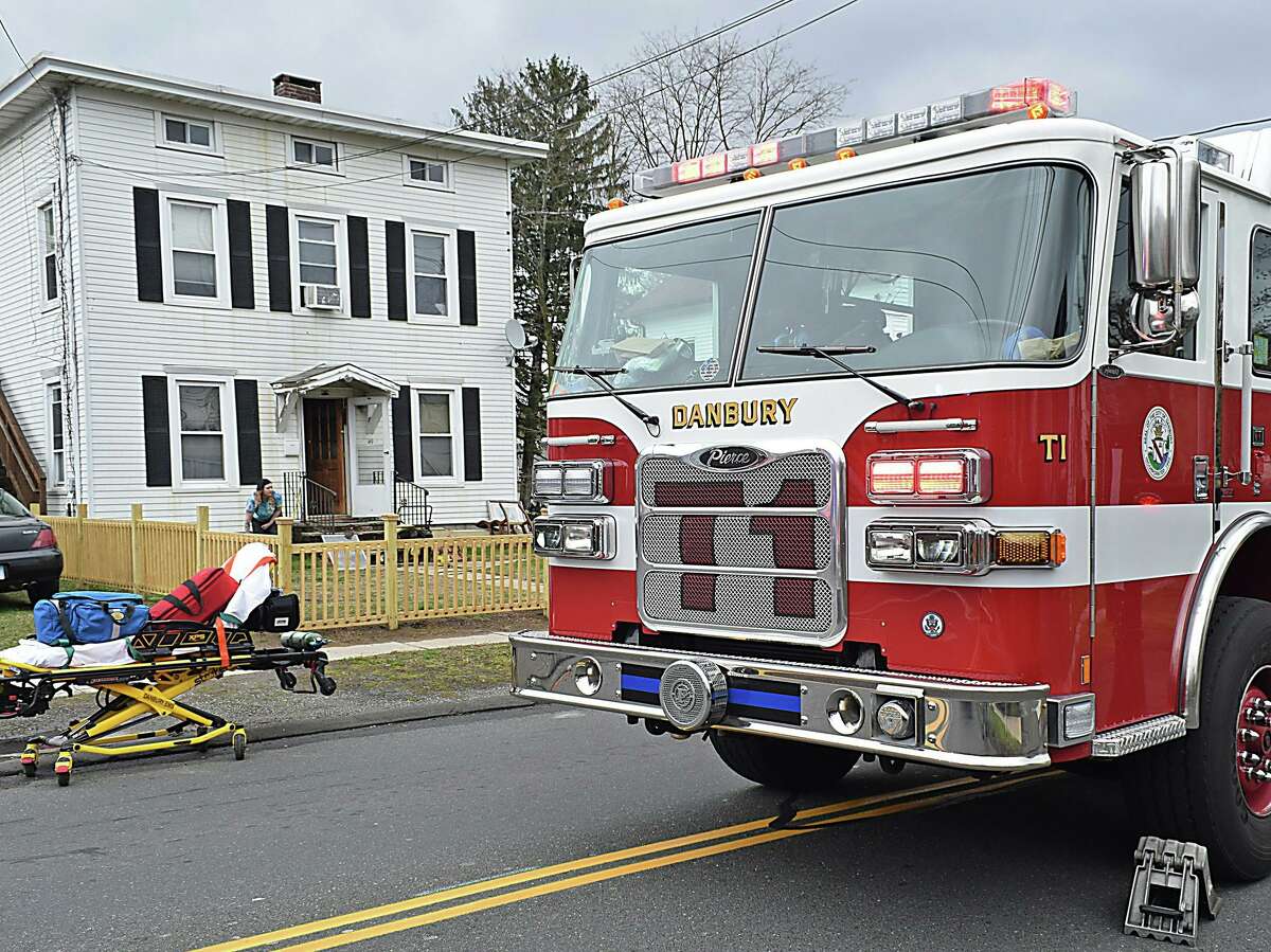 Emergency personnel respond to a structure fire on Locust Avenue in Danbury, Conn., on April 18, 2020. Danbury Fire Department plans to buy a new fire truck for $881,000.