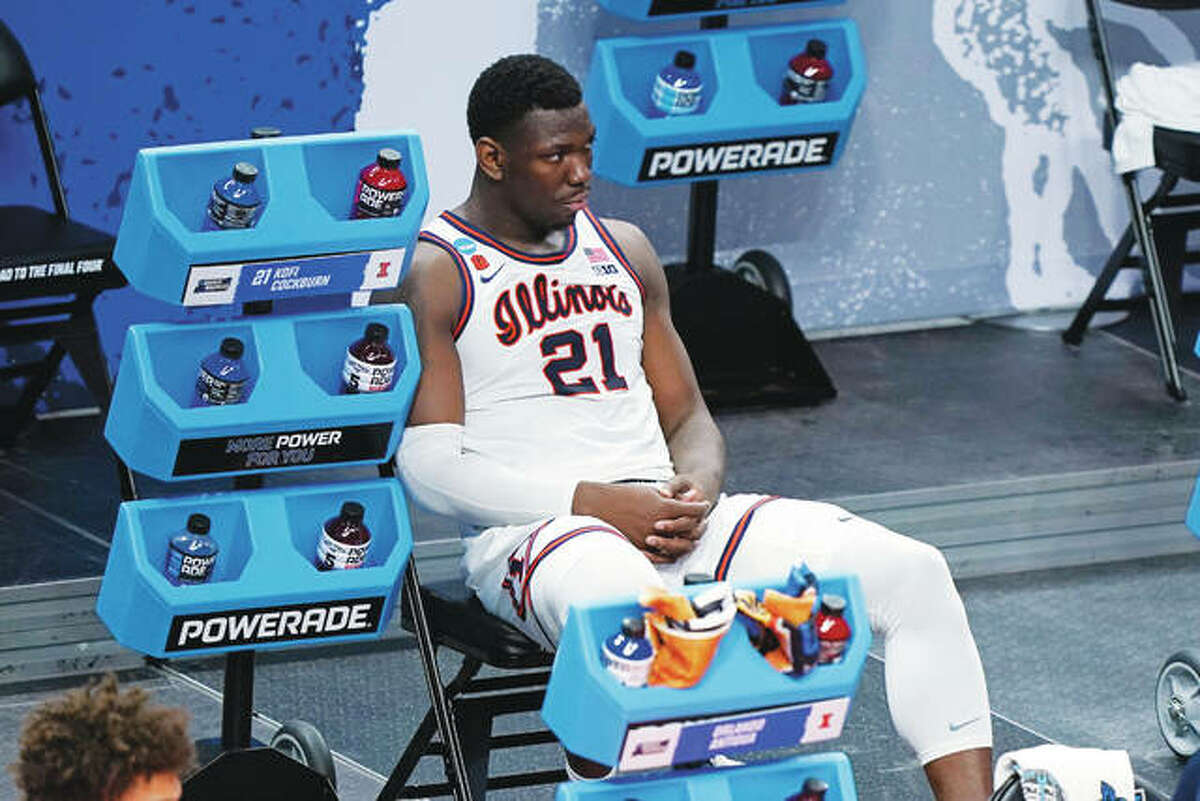 Illinois’ Kofi Cockburn watches the final moments of Illinois’ loss to Loyola of Chicago in a college basketball game in the second round of the NCAA tournament at Bankers Life Fieldhouse in Indianapolis Sunday, March 21, 2021. Loyola upset Illinois 71-58. (AP Photo/Mark Humphrey)