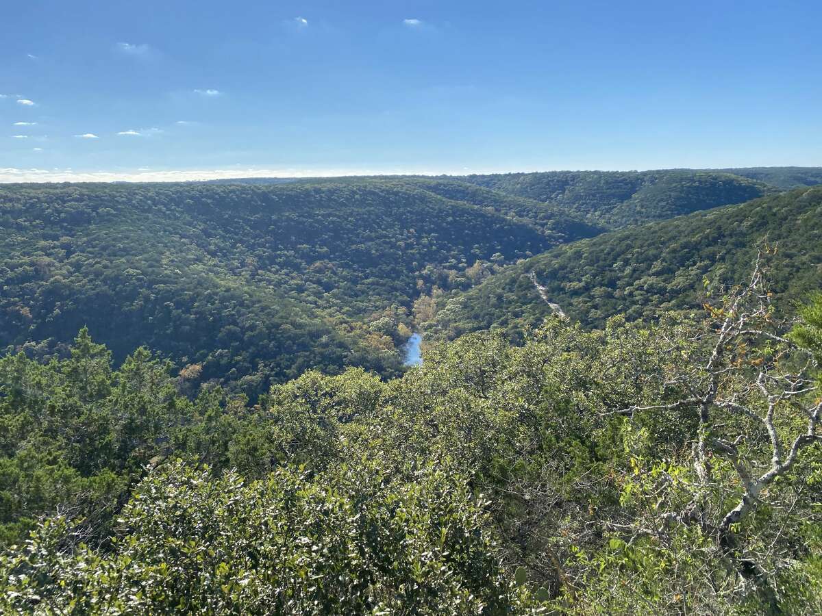 The view overlooking the trail is at Lost Maples State Natural Area.