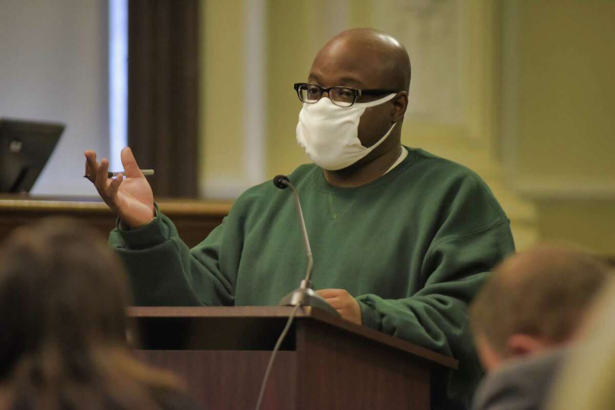 James White testified Thursday that he played no part in the slayings of two women and two children four years ago in Troy. White, who is representing himself at his quadruple murder trial, testified he was not in the apartment when the victims were killed. In this photography, White delivers his opening argument on Nov. 9, 2021, in Rensselaer County Court in Troy.