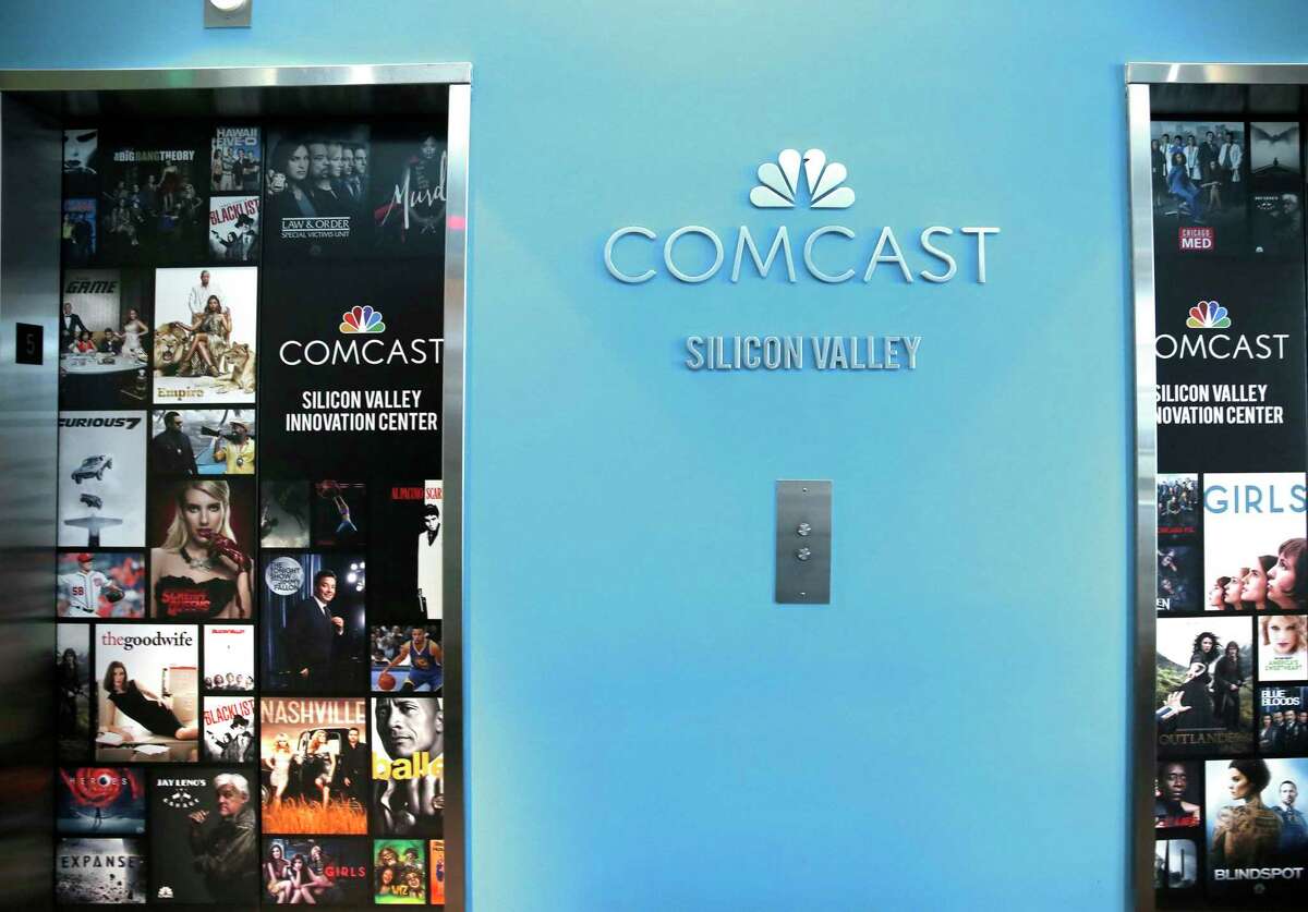 A view of the Comcast/NBC logo between the elevators on at the Comcast Silicon Valley Innovation Center in Sunnyvale, Calif. The company said it was still investigating the root cause of an outage that left thousands of Bay Area residents without internet service.