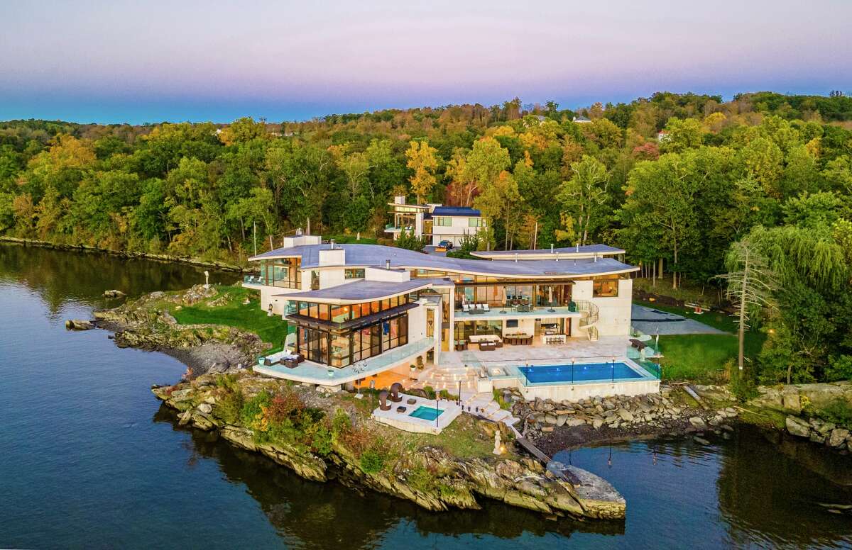 This waterfront estate, located at 46 Ledgerock Lane in Hyde Park, is among the last of its kind. Because of shoreline setback laws today, a home could never be built this close to the water here again.