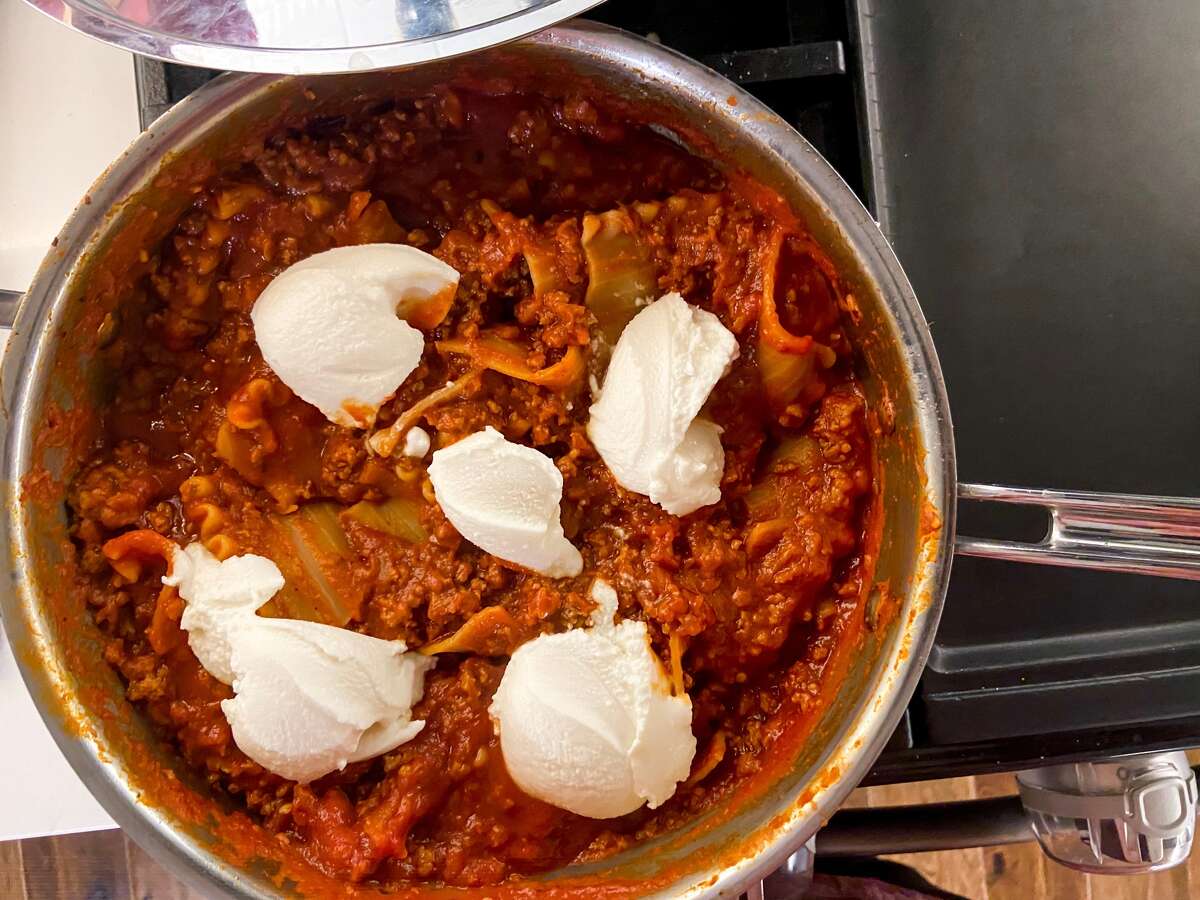 Sauce, cheese and broken noodles make up this 30-minute skillet lasagna. 