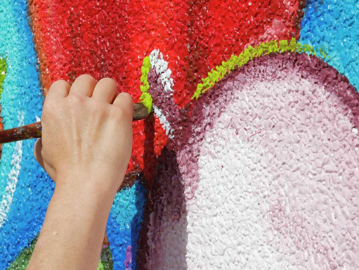 ‘This is perfect mural painting weather’