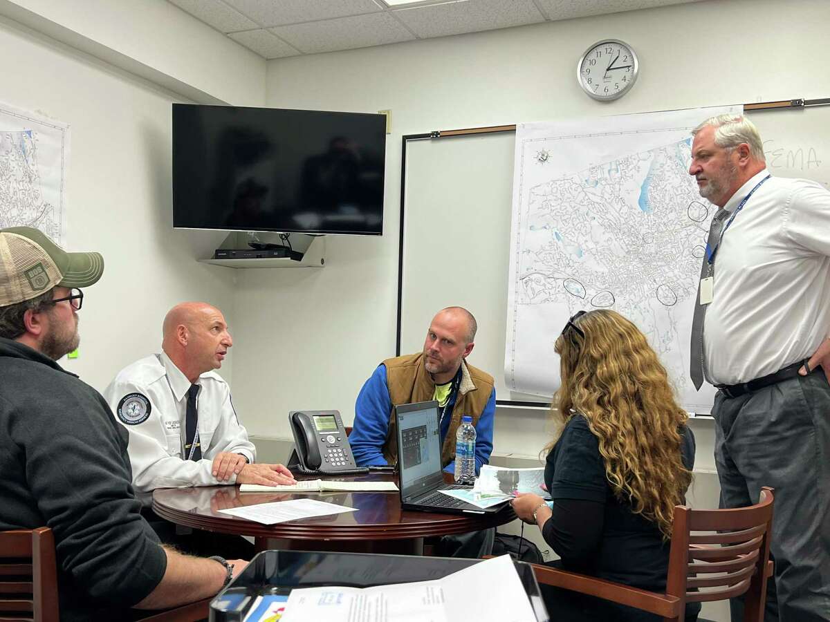 Officials from the Federal Emergency Management Agency met with Danbury leaders on Tuesday, Nov. 9, 2021 to discuss individual assitance for residents affected by the remnants of Hurricane Ida. Danbury Mayor Joe Cavo is pictured on the far right. Matthew Cassavechia, the city's emergency management director, is pictured second from the left. The map shows areas FEMA will target when knocking on residents' doors through the next couple of weeks.