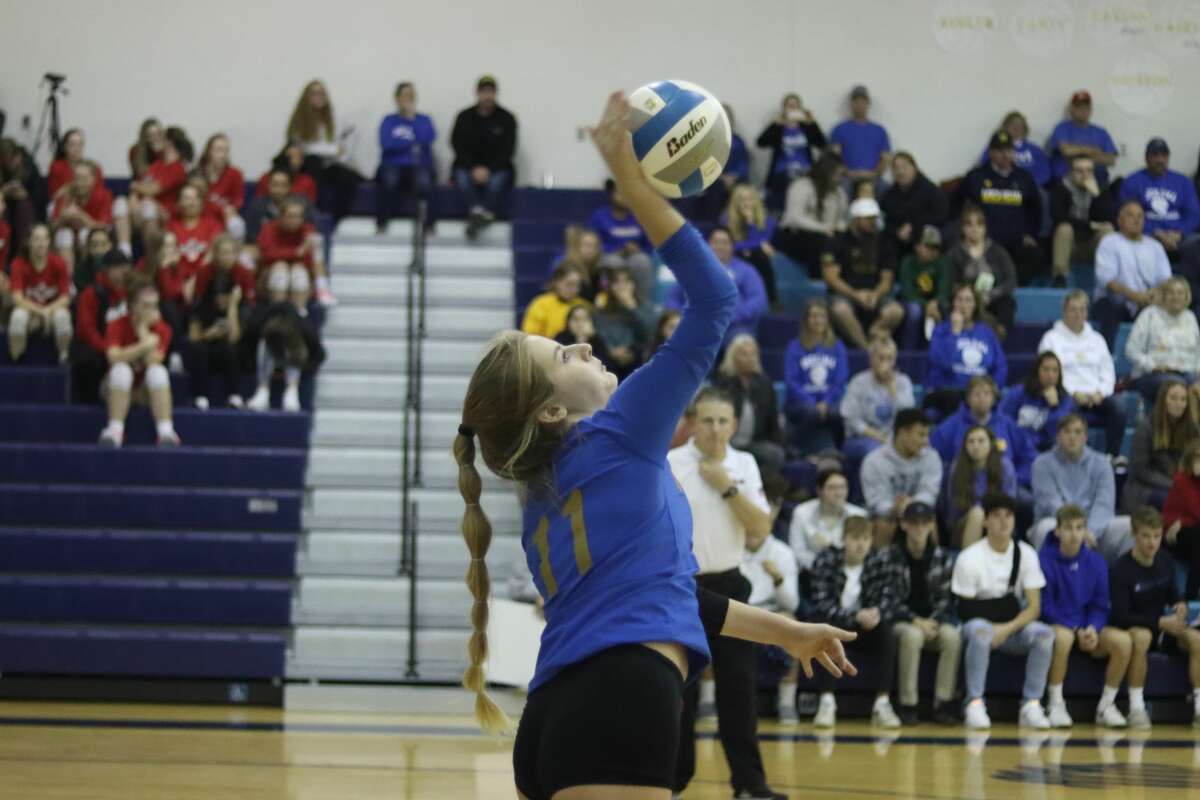 Kaylin Sam's serving run in the third set gave Onekama a brief lead on Nov. 9. 