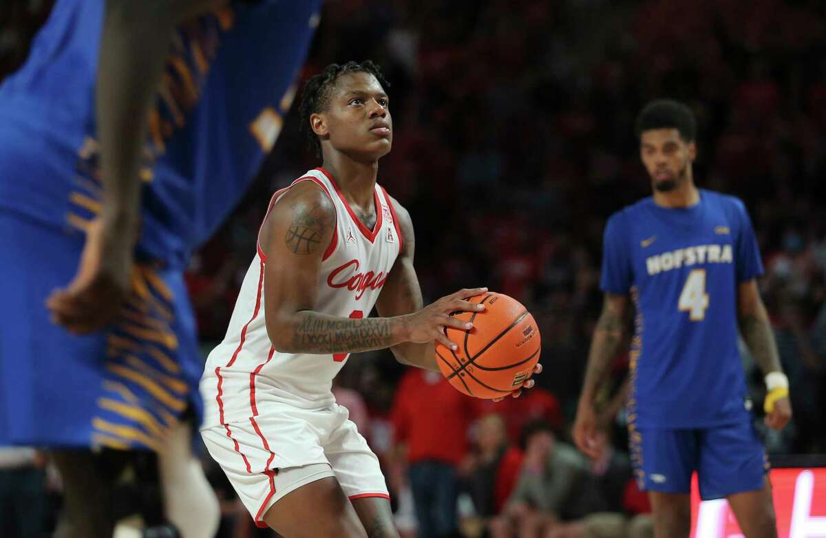 Houston Cougars guard Marcus Sasser (0) makes a free throw during overtime of the game against the Hofstra Pride Tuesday, Nov. 9, 2021, at Fertitta Center in Houston. The Cougars defeated the Pride 83-75 in overtime.