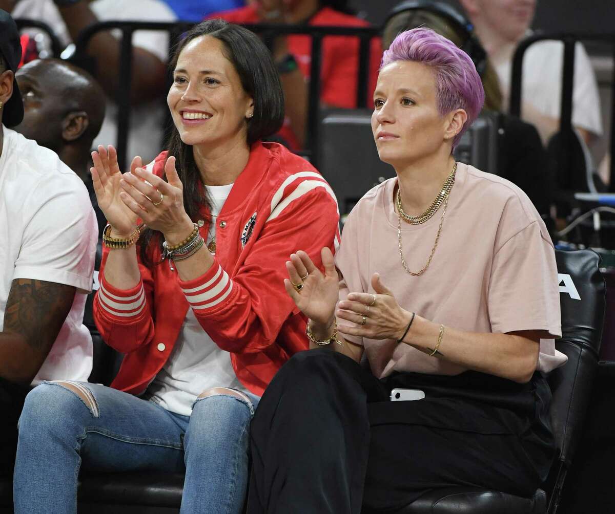 Sue Bird (L) of the Seattle Storm and soccer player Megan Rapinoe attend the WNBA All-Star Game 2019 at the Mandalay Bay Events Center on July 27, 2019 in Las Vegas, Nevada.