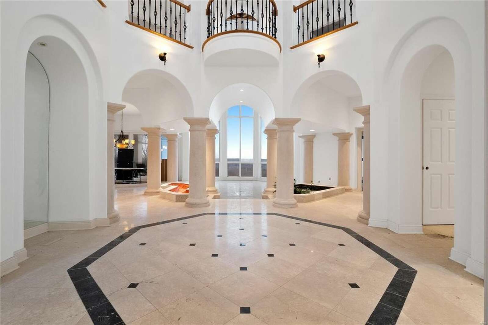 Look inside rapper Nelly's unfinished Missouri mansion that sold for less than $1M