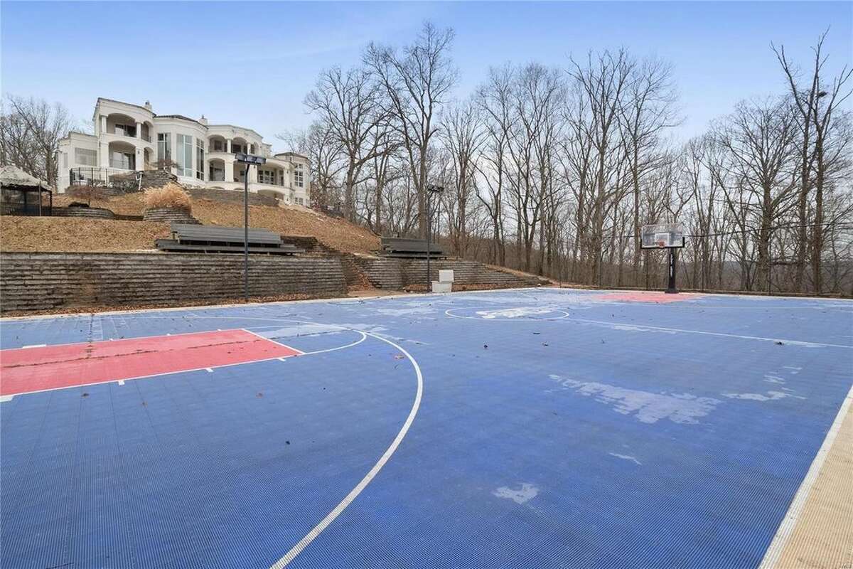 Nelly's mansion, located in the St. Louis suburb of Wildwood, Missouri in West St. Louis County, recently sold for less than $1 million after being listed at $600,000. The mansion features six bedrooms and seven bathrooms, as well as a hillside basketball court in the back of the property.