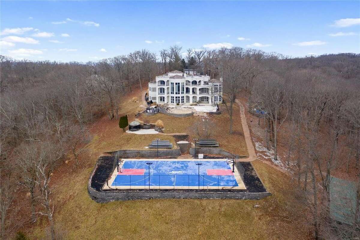 Nelly's mansion, located in the St. Louis suburb of Wildwood, Missouri in West St. Louis County, recently sold for less than $1 million after being listed at $600,000. The mansion features six bedrooms and seven bathrooms, as well as a hillside basketball court in the back of the property.