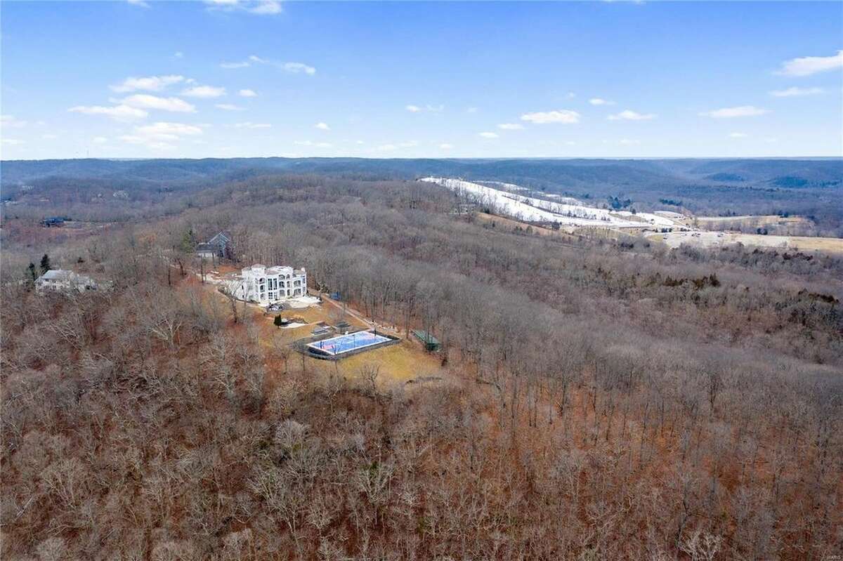 Nelly's mansion, located in the St. Louis suburb of Wildwood, Missouri in West St. Louis County, recently sold for less than $1 million after being listed at $600,000. The mansion features six bedrooms and seven bathrooms, as well as a hillside basketball court in the back of the property.