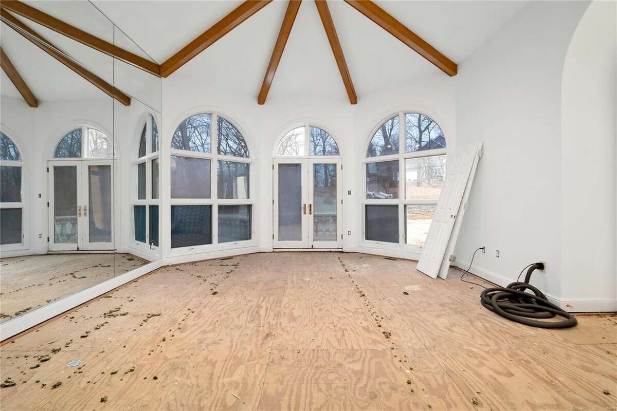 Nelly's mansion, located in the St. Louis suburb of Wildwood, Missouri in West St. Louis County, recently sold for less than $1 million after being listed at $600,000. The mansion features six bedrooms and seven bathrooms, as well as a hillside basketball court in the back of the property.