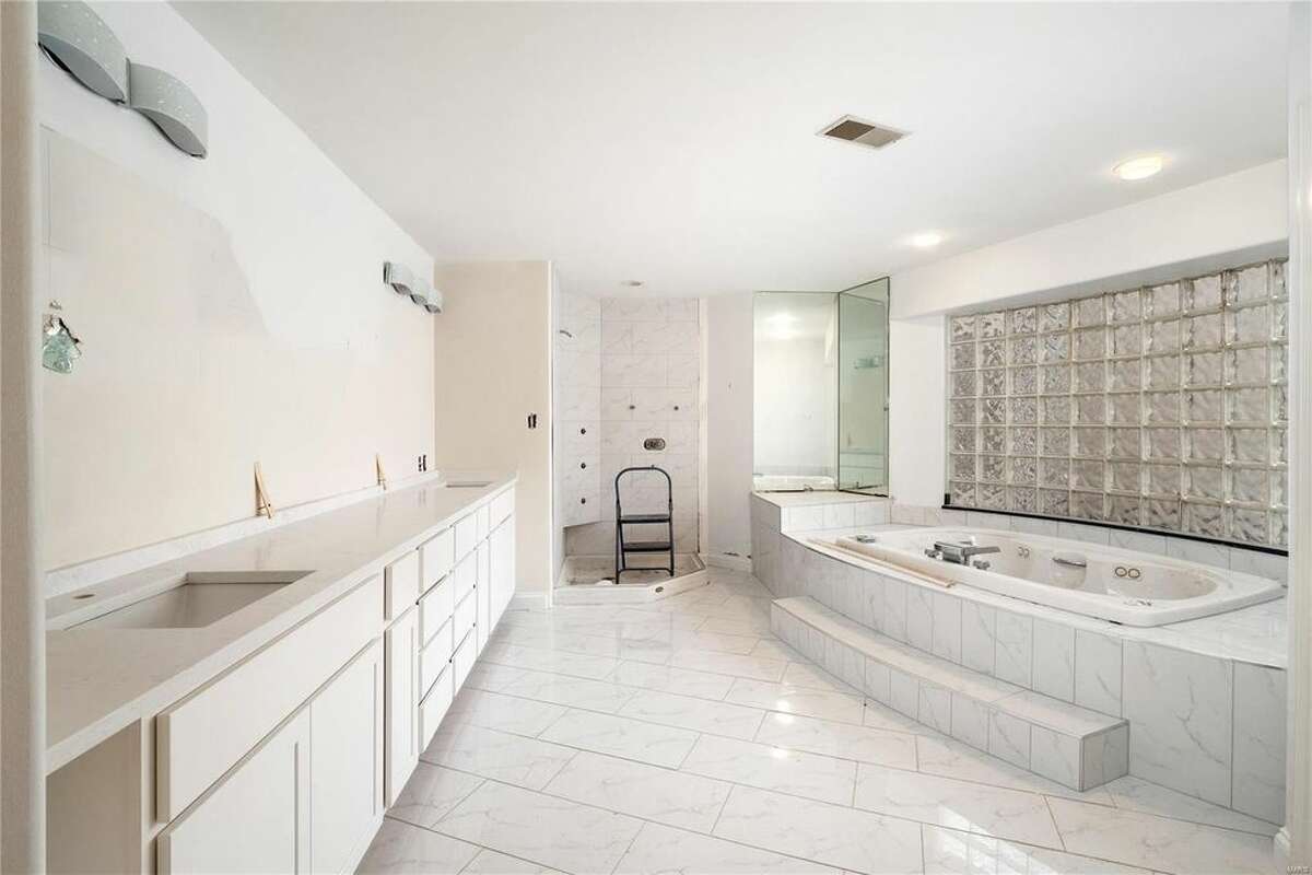 Nelly's mansion, located in the St. Louis suburb of Wildwood, Missouri in West St. Louis County, recently sold for less than $1 million after being listed at $600,000. The mansion features six bedrooms and seven bathrooms, as well as a hillside basketball court in the back of the property.