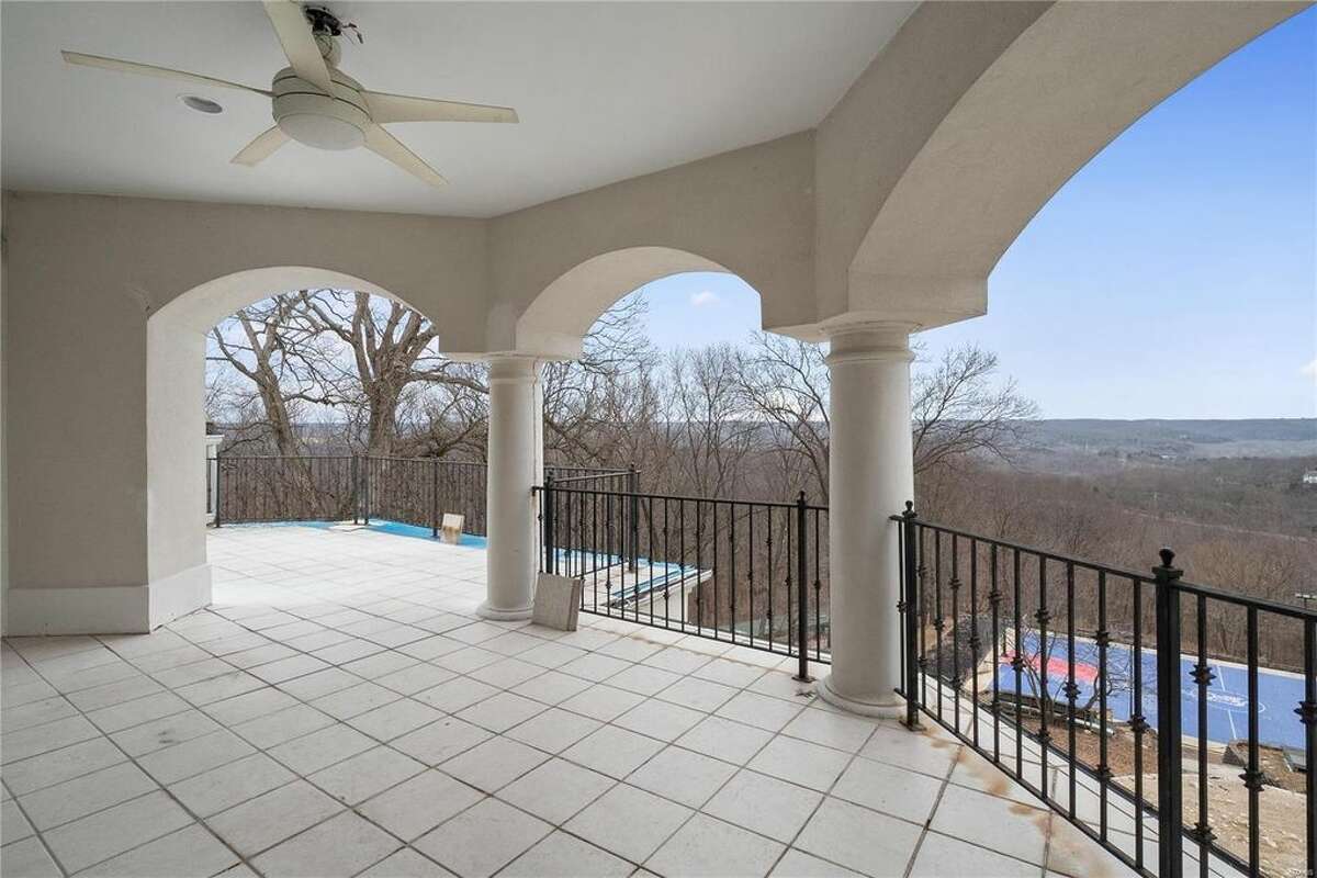 Nelly's mansion, located in the St. Louis suburb of Wildwood, Missouri in West St. Louis County, recently sold for less than $1 million after being listed at $600,000. The mansion features six bedrooms and seven bathrooms, as well as a hillside basketball court in the back of the property.