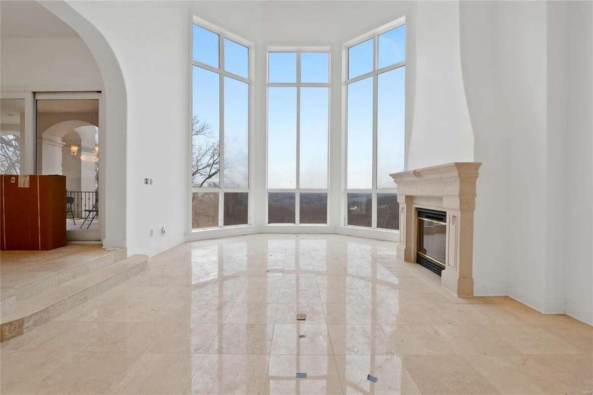 Nelly's mansion, located in the St. Louis suburb of Wildwood, Missouri in West St. Louis County, recently sold for less than $1 million after being listed at $600,000. The mansion features six bedrooms and seven bathrooms, as well as a hillside basketball court in the back of the property.