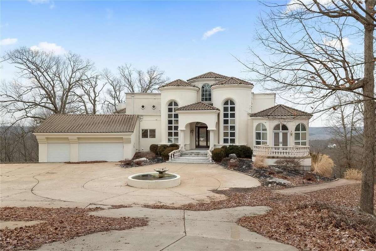 Nelly's mansion, located in the St. Louis suburb of Wildwood, Missouri in West St. Louis County, recently sold for less than $1 million after being listed at $600,000. The mansion features six bedrooms and seven bathrooms, as well as a hillside basketball court in the back of the property.