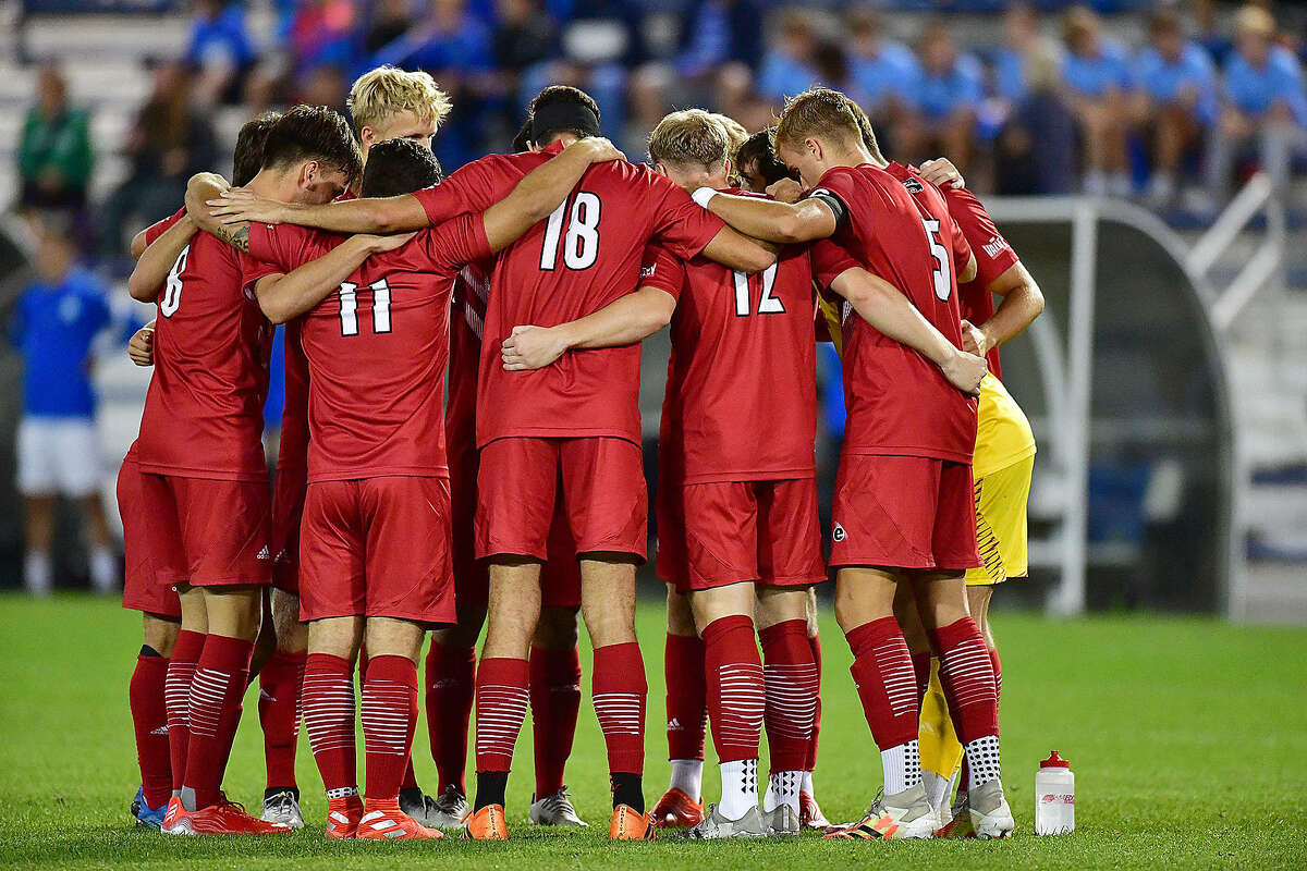 Members of the SIUE men's soccer team huddle before this season's Bronze Boot game at Saint Louis University. Tuesday, SIUE fell to Bradley 2-1 in the quarterfinals of the Missouri Valley Conference Tournament.