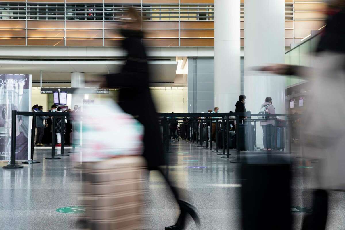 International travelers make their way through the international ticketing area at San Francisco International Airport.