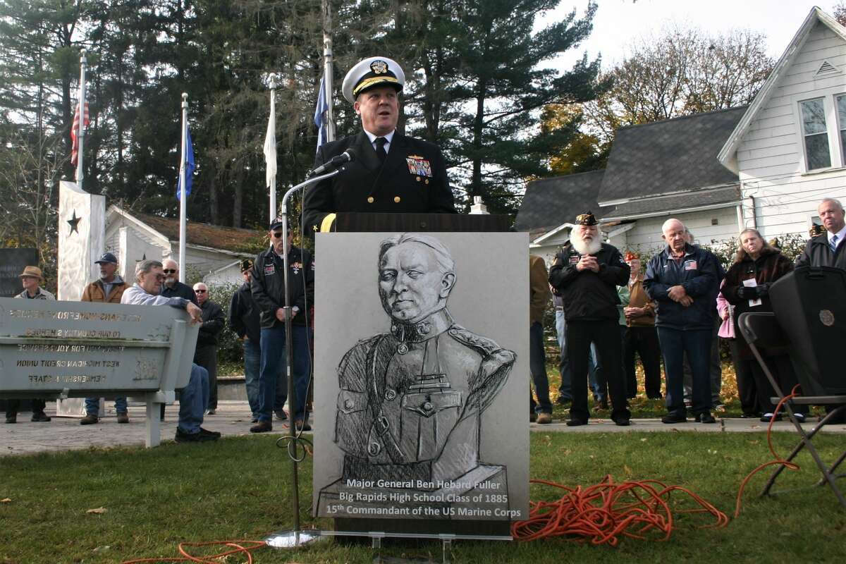 The monument honoring the 15th Commandant of the U. S. Marine Corps, General Ben Fuller, a native of Big Rapids was dedicated in an unveiling ceremony at Holland Park - Veterans and Homefront Memorial Park in Big Rapids this week. On hand for the unveiling were members of the Fuller family, artist and sculpture Gordon Mallett and U.S. Navy Admiral Larry LaGree, also a Big Rapids native.
