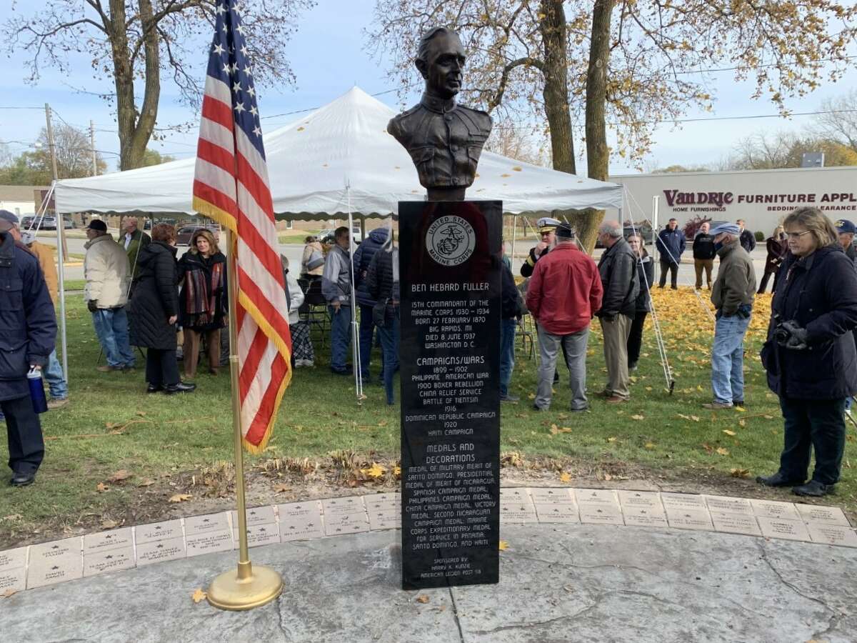 The monument honoring the 15th Commandant of the U. S. Marine Corps, General Ben Fuller, a native of Big Rapids was dedicated in an unveiling ceremony at Holland Park - Veterans and Homefront Memorial Park in Big Rapids this week. On hand for the unveiling were members of the Fuller family, artist and sculpture Gordon Mallett and U.S. Navy Admiral Larry LaGree, also a Big Rapids native.