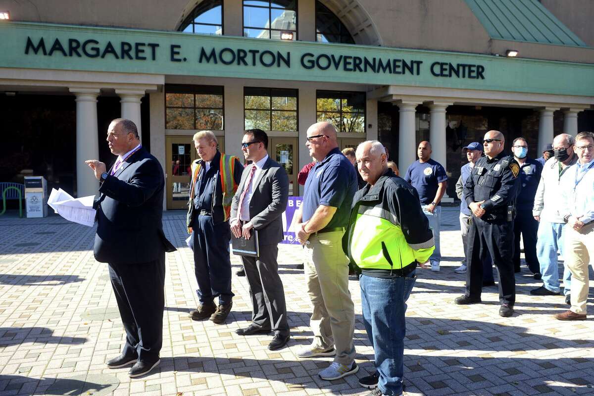 James Meszoros, President of NAGE (National Association of Government Employees) Local R1-200, speaks during a rally in front of the Morton Government Center, in Bridgeport, Conn. Nov. 10, 2021.