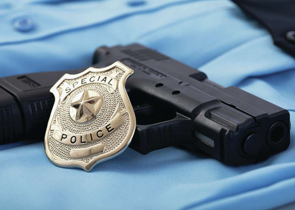 police officer badge and gun