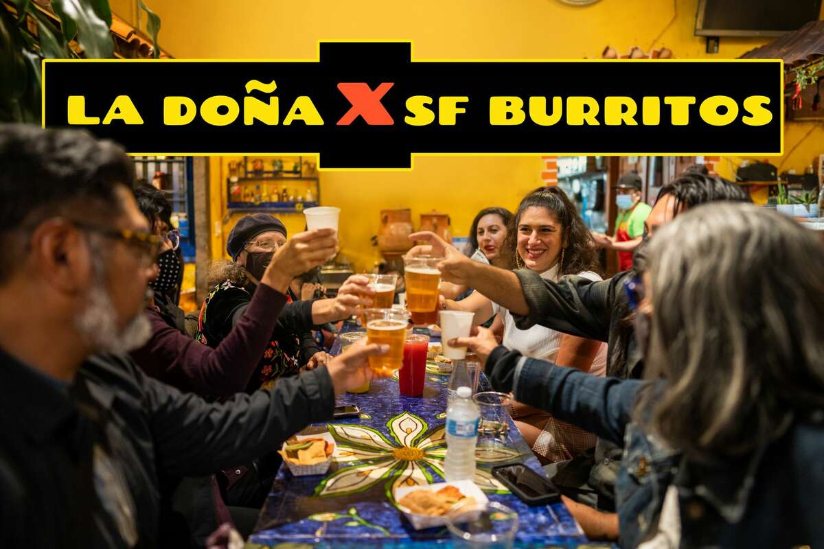 SFGATE's burrito reviewer, Cecilia Peña-Govea, aka La Doña (third from right), celebrates with friends and family at El Metate, in San Francisco's Mission District, on Thursday, Nov. 3.